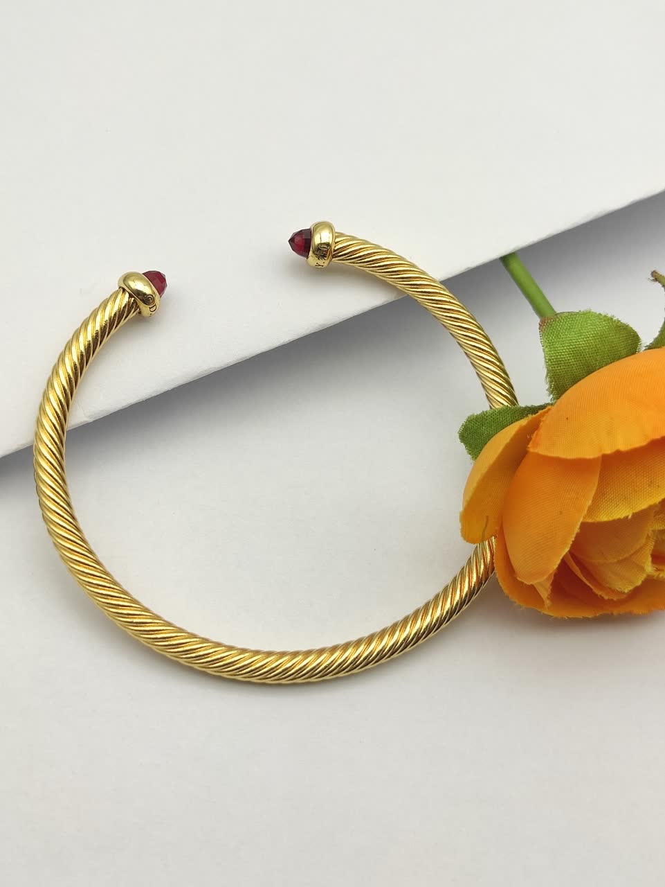David Yurman Gold Tone Wire Bangle Bracelet with Red Gemstone